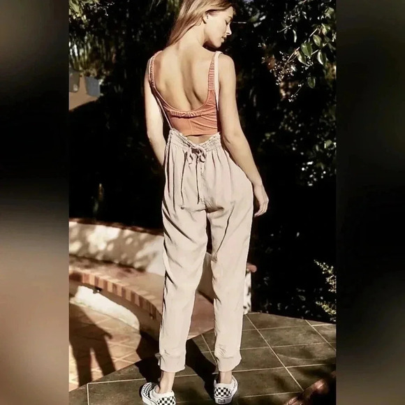 Free People Movement One Piece Split Rock Jumpsuit in Ivory - Picture 6 of 6